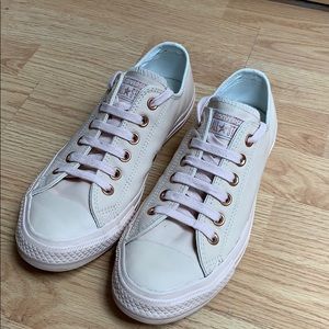 Converse rose gold blush leather low flat shoes.